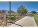 Scenic walking trail surrounded by natural landscape and landscaping, providing residents an outdoor experience at 1641 Blue Cliffs Ave, Henderson, NV 89014