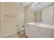Bathroom with a white vanity and ample lighting creating a clean, fresh space at 20 E Serene Ave # 401, Las Vegas, NV 89123