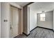 Hallway entrance featuring a unit number, with a view of the entry area and carpeted floor at 20 E Serene Ave # 401, Las Vegas, NV 89123