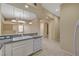 Kitchen featuring white cabinets, granite countertops, stainless dishwasher, and undermount sink at 20 E Serene Ave # 401, Las Vegas, NV 89123