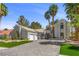 Charming single-story home boasts lush landscaping, palm trees and a three car garage at 2268 Buckingham Ct, Henderson, NV 89074