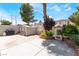 Backyard featuring a large concrete patio area, privacy fencing, and a storage shed at 25 Colbath St, Las Vegas, NV 89110