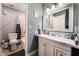 Bathroom featuring a framed mirror, updated lighting, and a shower-tub combination at 25 Colbath St, Las Vegas, NV 89110