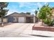 Charming single-story home with a well-maintained front yard and convenient carport at 25 Colbath St, Las Vegas, NV 89110