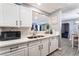 Stylish kitchen features updated counters, ample cabinet space, and modern sink fixture at 25 Colbath St, Las Vegas, NV 89110