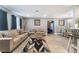 Spacious living room with access to the bedroom, dining, and kitchen areas at 25 Colbath St, Las Vegas, NV 89110