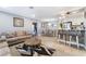 Bright and open living space with comfortable seating and a view of the kitchen at 25 Colbath St, Las Vegas, NV 89110