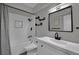 Updated bathroom featuring subway tile, black fixtures, and modern vanity at 2635 Heritage Ct, Las Vegas, NV 89121
