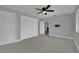 Spacious bedroom features double closets, neutral carpeting, and ample space for relaxation, perfect for a serene retreat at 2635 Heritage Ct, Las Vegas, NV 89121