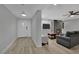 Open concept living area with fireplace, tile accents, and neutral tones at 2635 Heritage Ct, Las Vegas, NV 89121