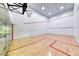 A basketball hoop on a racquetball court with red line details, featuring a bright, active recreational space at 270 E Flamingo Rd # 223, Las Vegas, NV 89169