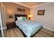 Cozy bedroom with a blue comforter on a queen bed at 270 E Flamingo Rd # 223, Las Vegas, NV 89169