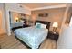 Bedroom with mirrored closet doors and light wood floor, queen bed with side tables at 270 E Flamingo Rd # 223, Las Vegas, NV 89169