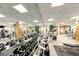 Well-equipped gym features weightlifting machines, dumbbells, and mirrors for a comprehensive fitness experience at 270 E Flamingo Rd # 223, Las Vegas, NV 89169