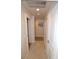 Hallway featuring neutral paint and doors, as well as tile floors at 270 E Flamingo Rd # 223, Las Vegas, NV 89169