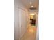 Bright hallway featuring tile flooring, storage closet and access to the bathroom at 270 E Flamingo Rd # 223, Las Vegas, NV 89169