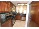 Gourmet kitchen featuring granite countertops, stainless appliances, and stylish cabinets at 270 E Flamingo Rd # 223, Las Vegas, NV 89169