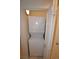 A stacked washer and dryer inside a white door at 270 E Flamingo Rd # 223, Las Vegas, NV 89169