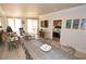 Bright and spacious living area and dining with tile flooring, modern decor, and access to a balcony at 270 E Flamingo Rd # 223, Las Vegas, NV 89169