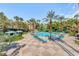 Beautiful pool area surrounded by palm trees, lounge chairs, and resort-style amenities at 270 E Flamingo Rd # 223, Las Vegas, NV 89169