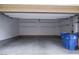 Clean, organized garage space with ample storage and shelving, ready for vehicles and projects at 2761 Frosted Teal Ave, North Las Vegas, NV 89086