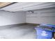 Spacious garage with built in shelving for storage and parking. Features new epoxy flooring at 2761 Frosted Teal Ave, North Las Vegas, NV 89086