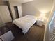 Cozy bedroom features carpet and neutral tones, creating a warm and inviting atmosphere at 2840 China Cove St, Laughlin, NV 89029