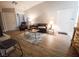 Inviting living room with a modern sofa, plush rug, and neutral color palette at 2840 China Cove St, Laughlin, NV 89029