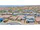 Wide angle aerial view of a desert community with single and two story homes at 2910 Monate Ct, Henderson, NV 89044