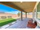 Comfortable covered patio with pavers leading to low maintenance desert landscaping at 2910 Monate Ct, Henderson, NV 89044