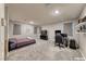 Cozy bedroom featuring large windows, a gaming setup, and neutral decor at 2910 Monate Ct, Henderson, NV 89044