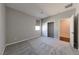 Neutral bedroom featuring carpet, closet, and blinds for optimal light control at 2910 Monate Ct, Henderson, NV 89044