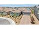 Beautiful single story home featuring desert landscaping, brick paver driveway, and a two car garage at 2910 Monate Ct, Henderson, NV 89044