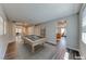 Spacious game room featuring a pool table and hardwood floors at 2910 Monate Ct, Henderson, NV 89044