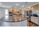 Beautiful kitchen features a large island, stainless steel appliances and granite countertops at 2910 Monate Ct, Henderson, NV 89044
