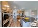 Modern kitchen with stainless steel appliances and an island at 2910 Monate Ct, Henderson, NV 89044