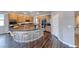 Modern kitchen boasts stainless appliances, breakfast bar, and wood cabinets at 2910 Monate Ct, Henderson, NV 89044