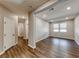Bright living room features recessed lighting, wood-look flooring, and neutral walls at 2910 Monate Ct, Henderson, NV 89044