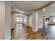 Inviting living room with abundant natural light, showcasing stylish flooring and architectural details at 2910 Monate Ct, Henderson, NV 89044