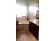Bright bathroom with marble countertops, a soaking tub, and ample natural light at 3301 W Colton Ave, North Las Vegas, NV 89032