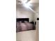 Comfortable bedroom with white wood floors, soft lighting, and closet at 3301 W Colton Ave, North Las Vegas, NV 89032