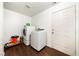 Clean laundry room with white washer and dryer at 3481 Winery Rd, Pahrump, NV 89048