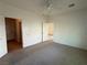 Bedroom with adjoining bathroom and neutral carpet flooring at 3508 Kittiwake Rd, North Las Vegas, NV 89084