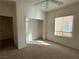Bedroom with neutral carpet, ceiling fan, window and closet with shelving at 3508 Kittiwake Rd, North Las Vegas, NV 89084