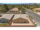 Single-Gathering home located in a mature neighborhood, with a privacy wall, palm trees, and desert landscaping at 3706 Etendre Ct, Las Vegas, NV 89121