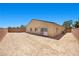 The home features a spacious and private backyard with desert landscaping at 3706 Etendre Ct, Las Vegas, NV 89121