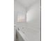 Close-up of a soaking tub with a window, offering a relaxing and spa-like experience in a bright bathroom at 3706 Etendre Ct, Las Vegas, NV 89121
