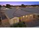 Single-Gathering home with an attached three-car garage and well-kept landscaping at the corner of a tree-lined street at 3706 Etendre Ct, Las Vegas, NV 89121