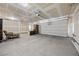 Large garage featuring an automatic door and plenty of room for storage at 3706 Etendre Ct, Las Vegas, NV 89121