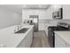 Spacious kitchen features stainless appliances, stylish countertops, and a large center island at 3706 Etendre Ct, Las Vegas, NV 89121